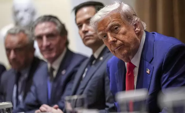 President Donald Trump, from right, Secretary of State Marco Rubio, Interior Secretary Doug Burgum and Health and Human Services Secretary Robert F. Kennedy, Jr., attend a cabinet meeting at the White House in Washington, D.C., U.S., April 10, 2025. REUTERS/Nathan Howard