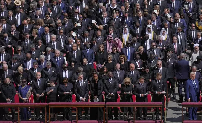 President Donald Trump, front row right, and Ukraine's President Volodymr Zelenskyy, front row left, are seen amongst other dignitaries during the funeral of Pope Francis in St. Peter's Square at the Vatican, Saturday, April 26, 2025. (AP Photo/Gregorio Borgia)