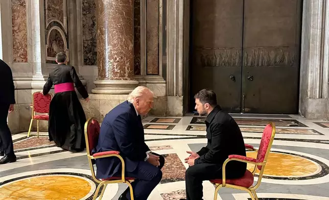 In this photo provided by the Ukrainian Presidential Press Office, Ukraine's President Volodymyr Zelenskyy, right, and President Donald Trump, talk as they attend the funeral of Pope Francis in Vatican, Saturday, April 26, 2025.(Ukrainian Presidential Press Office via AP)