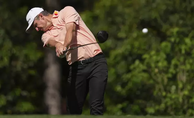 Justin Rose hits his tee shot on the 11th hole during the final round at the Masters golf tournament, Sunday, April 13, 2025, in Augusta, Ga. (AP Photo/Matt Slocum)