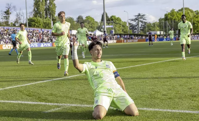 Barcelona's Hugo Alba celebrates scoring during the UEFA Youth League Final match between Trabzonspor and Barcelona, at the Colovray Sports Centre in Nyon, Switzerland, Monday, April 28, 2025. (Salvatore Di Nolfi/Keystone via AP)