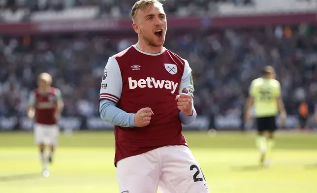 West Ham United's Jarrod Bowen celebrates scoring the opening goal, during the English Premier League soccer match between West Ham United and Southampton at London Stadium, London, Saturday April 19, 2025. (Nigel French/PA via AP)
