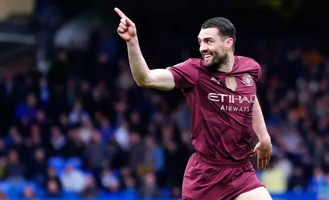 Manchester City's Mateo Kovacic celebrates scoring during the English Premier League soccer match between Everton and Manchester City at Goodison Park, Liverpool, England, Saturday April 19, 2025. (Peter Byrne/PA via AP)