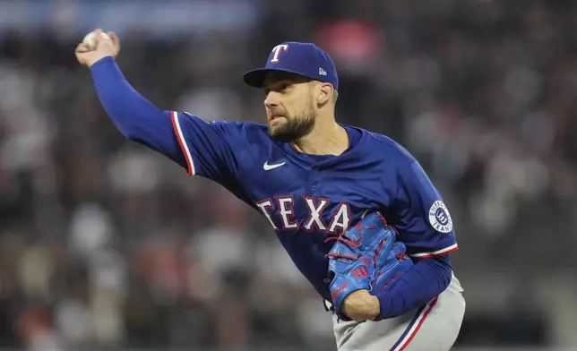 Texas Rangers pitcher Nathan Eovaldi works against the San Francisco Giants during the second inning of a baseball game in San Francisco, Friday, April 25, 2025. (AP Photo/Jeff Chiu)