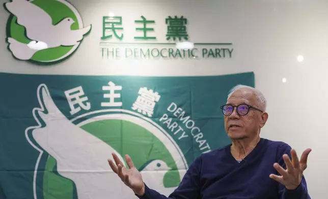 Yeung Sum, the founding member of the Democratic Party, reacts during an interview at the Democratic Party's office in Prince Edward in Hong Kong on April 2, 2025. (AP Photo/May James)