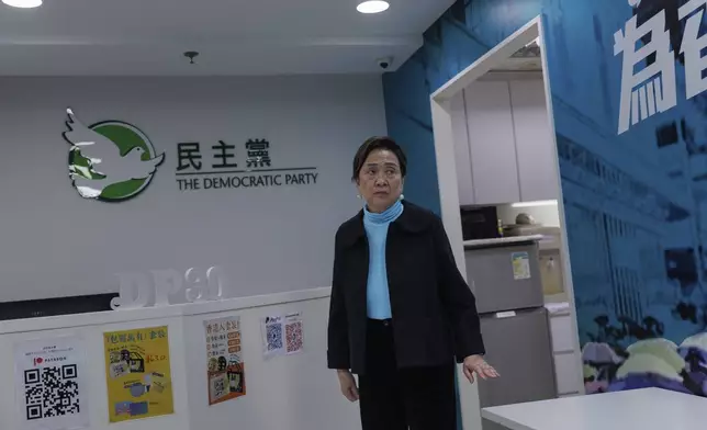 Emily Lau, former chairperson of the Democratic Party, walks through the Democratic Party's office in Prince Edward in Hong Kong on April 2, 2025. (AP Photo/May James)