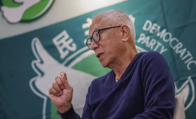 Yeung Sum, the founding member of the Democratic Party, speaks during an interview at the Democratic Party's office in Prince Edward in Hong Kong on April 2, 2025. (AP Photo/May James)