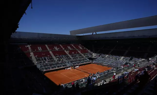 The Madrid Open tennis tournament venue is empty during a general blackout in Madrid, Monday, April 28, 2025. (AP Photo/Manu Fernandez)