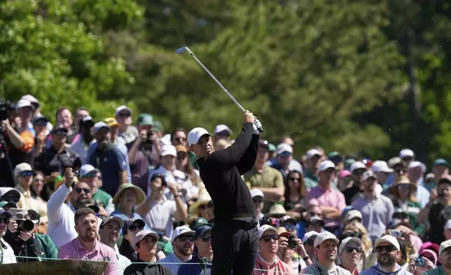 Rory McIlroy, of Northern Ireland, hits from the 12th tee during a practice round at the Masters golf tournament, Tuesday, April 8, 2025, in Augusta, Ga. (AP Photo/Matt Slocum)
