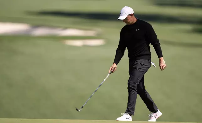 Rory McIlroy, of Northern Ireland, walks up the 10th fairway during a practice round at the Masters golf tournament, Tuesday, April 8, 2025, in Augusta, Ga. (AP Photo/Matt Slocum)