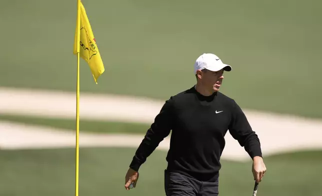 Rory McIlroy, of Northern Ireland, walks up the 10th fairway during a practice round at the Masters golf tournament, Tuesday, April 8, 2025, in Augusta, Ga. (AP Photo/Matt Slocum)