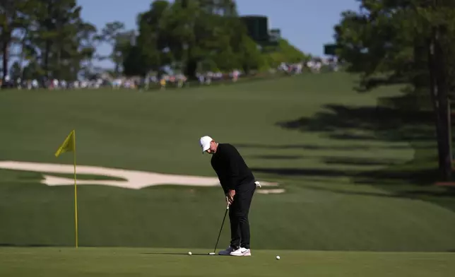 Rory McIlroy, of Northern Ireland, putts on the 10th green during a practice round at the Masters golf tournament, Tuesday, April 8, 2025, in Augusta, Ga. (AP Photo/Matt Slocum)