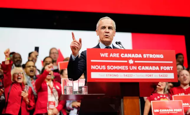 Canadian Prime Minister Mark Carney speaks on stage at his campaign headquarters after the Liberal Party won the Canadian election in Ottawa on Tuesday, April 29, 2025. (Justin Tang/The Canadian Press via AP)