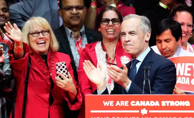 Canadian Prime Minister Mark Carney smiles on stage at his campaign headquarters after the Liberal Party won the Canadian election in Ottawa, Tuesday, April 29, 2025. (Frank Gunn/The Canadian Press via AP)/The Canadian Press via AP)
