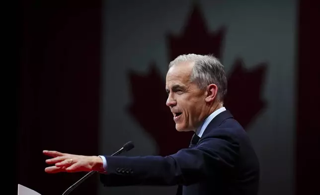 Canadian Prime Minister Mark Carney addresses supporters at Liberal campaign headquarters in Ottawa, Tuesday, April 29, 2025. (Sean Kilpatrick/The Canadian Press via AP)