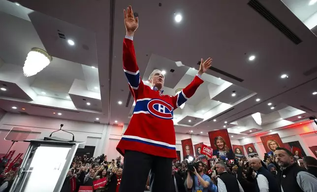 Liberal leader Prime Minister Mark Carney holds a rally in Laval, Quebec, on Tuesday, April 22, 2025. (Sean Kilpatrick/The Canadian Press via AP)