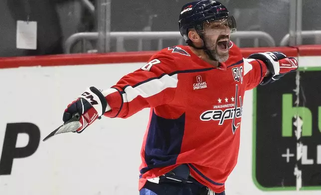 Washington Capitals left wing Alex Ovechkin (8) celebrating his 894th goal during the third period of an NHL hockey game against the Chicago Blackhawks, Friday, April 4, 2025, in Washington. (AP Photo/Nick Wass)