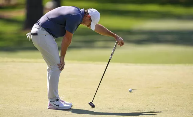 Rory McIlroy, of Northern Ireland, reacts after missing a putt on the seventh hole during the final round at the Masters golf tournament, Sunday, April 13, 2025, in Augusta, Ga. (AP Photo/David J. Phillip)