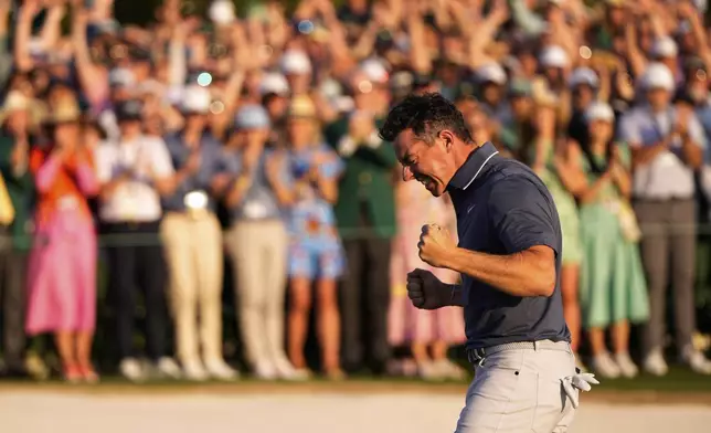 Rory McIlroy, of Northern Ireland, reacts after winning in a playoff against Justin Rose after the final round at the Masters golf tournament, Sunday, April 13, 2025, in Augusta, Ga. (AP Photo/Julia Demaree Nikhinson)