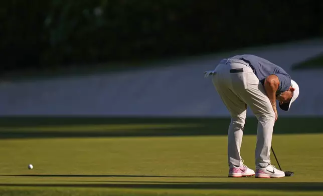 Rory McIlroy, of Northern Ireland, reacts after missing a putt on the 13th hole during the final round at the Masters golf tournament, Sunday, April 13, 2025, in Augusta, Ga. (AP Photo/Julia Demaree Nikhinson)