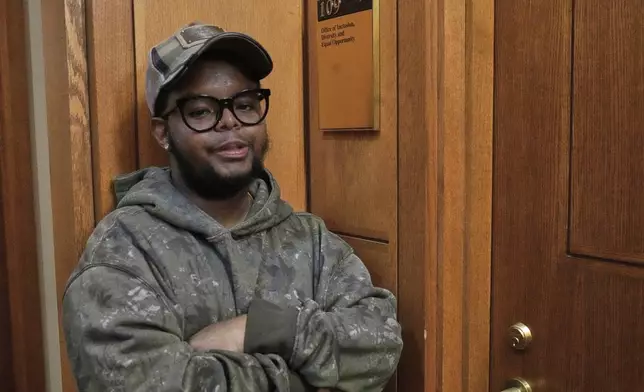 Case Western Reserve University student. Justen Pippens poses for a photo outside the recently closed Office of Inclusion, Diversity and Equal Opportunity at the school In Cleveland Thursday, April 17, 2025. (AP Photo/Sue Ogrocki)
