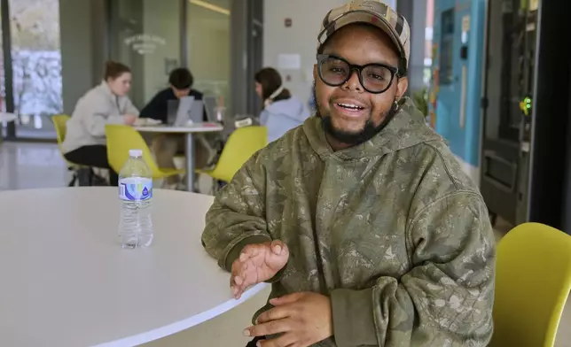 Case Western Reserve University student. Justen Pippens poses for a photo in the student union at the school In Cleveland Thursday, April 17, 2025. (AP Photo/Sue Ogrocki)