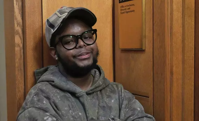 Case Western Reserve University student. Justen Pippens poses for a photo outside the recently closed Office of Inclusion, Diversity and Equal Opportunity at the school In Cleveland Thursday, April 17, 2025. (AP Photo/Sue Ogrocki)