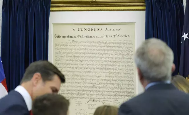 A replica of the Declaration of Independence is pictured during a swearing in ceremony for Dr. Mehmet Oz to be Administrator of the Centers for Medicare and Medicaid Services, in the Oval Office of the White House, Friday, April 18, 2025, in Washington. (AP Photo/Alex Brandon)