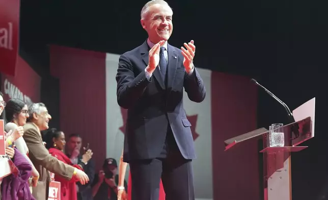 Canadian Prime Minister Mark Carney arrives to address supporters at his campaign headquarters on election night in Ottawa, Ontario, Tuesday, April 29, 2025. (Nathan Denette/The Canadian Press via AP)