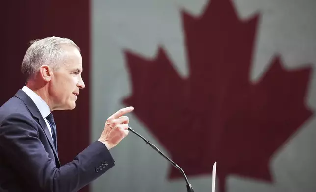 Canadian Prime Minister Mark Carney addresses supporters at his campaign headquarters on election night in Ottawa, Tuesday, April 29, 2025. (Nathan Denette//The Canadian Press via AP)