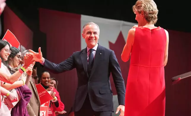 Canadian Prime Minister Mark Carney arrives to address supporters at his campaign headquarters on election night in Ottawa, Ontario, Tuesday, April 29, 2025. (Nathan Denette/The Canadian Press via AP)