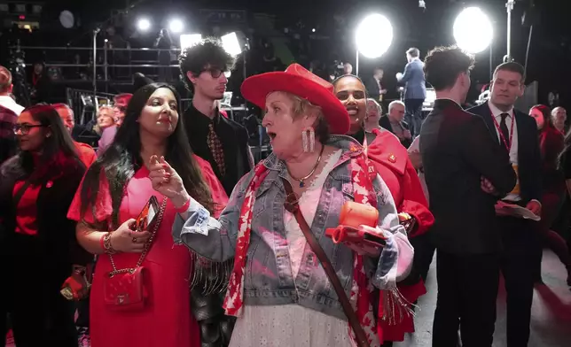 Liberal Party's supporters cheer on results at the party election night headquarters in Ottawa, Monday, April 28, 2025. (Nathan Denette/The Canadian Press via AP)
