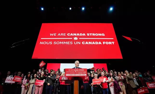 Canadian Prime Minister Mark Carney speaks to supporters on stage at his campaign headquarters after the Liberal Party won the Canadian election in Ottawa, Tuesday, April 29, 2025. (Justin Tang//The Canadian Press via AP)