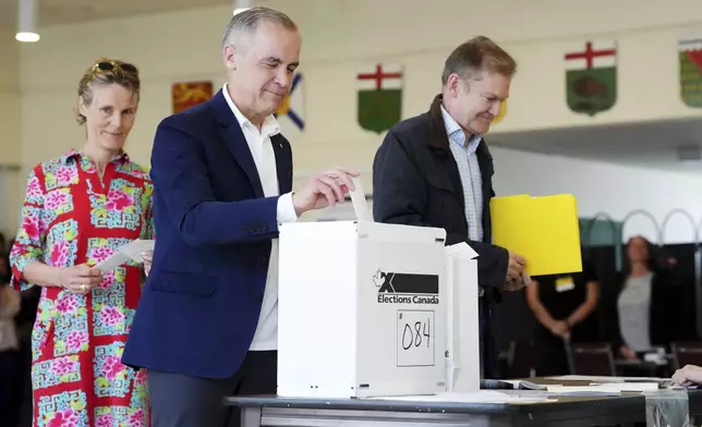 Canada's new Prime Minister and Liberal Leader Mark Carney casts his vote in Ottawa, Ontario, Monday, April 28, 2025. (Sean Kilpatrick/The Canadian Press via AP)