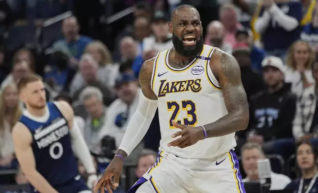 Los Angeles Lakers' Lebron James reacts after a call by a referee during the second half of Game 4 of an NBA basketball first-round playoff series against the Minnesota Timberwolves, Sunday, April 27, 2025, in Minneapolis. (AP Photo/Abbie Parr)