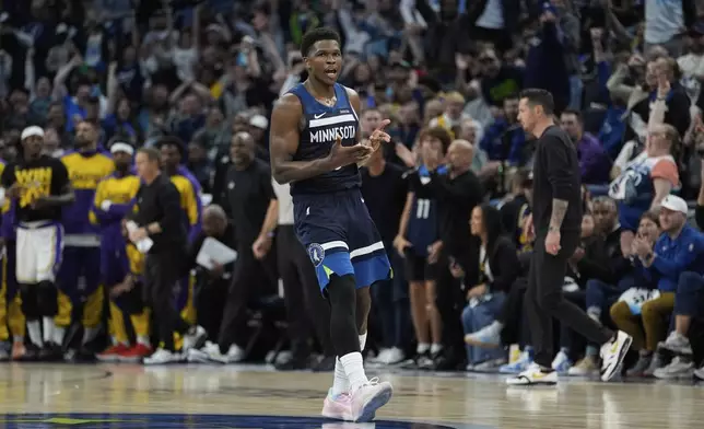 Minnesota Timberwolves guard Anthony Edwards (5) celebrates after making a 3-point shot during the second half of Game 4 of an NBA basketball first-round playoff series against the Los Angeles Lakers, Sunday, April 27, 2025, in Minneapolis. (AP Photo/Abbie Parr)
