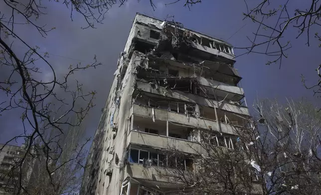 A residential building damaged by a Russian strike in Zaporizhzhia, Ukraine, Tuesday, April 22, 2025. (AP Photo/Andriy Andriyenko)