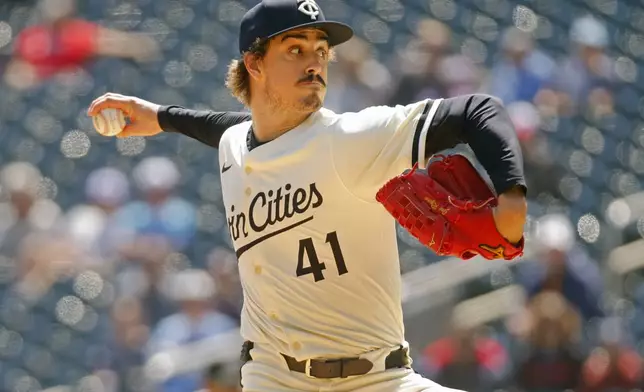 Minnesota Twins starting pitcher Joe Ryan throws to the Los Angeles Angels in the first inning of a baseball game Sunday, April 27, 2025, in Minneapolis. (AP Photo/Bruce Kluckhohn)