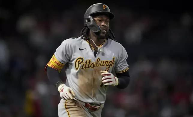 Pittsburgh Pirates outfielder Oneil Cruz runs the bases after hitting a home run during the fifth inning of a baseball game against the Los Angeles Angels, Wednesday, April 23, 2025, in Anaheim, Calif. (AP Photo/Eric Thayer)