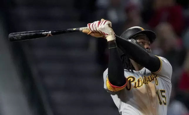 Pittsburgh Pirates outfielder Oneil Cruz hits a home run during the fifth inning of a baseball game against the Los Angeles Angels, Wednesday, April 23, 2025, in Anaheim, Calif. (AP Photo/Eric Thayer)