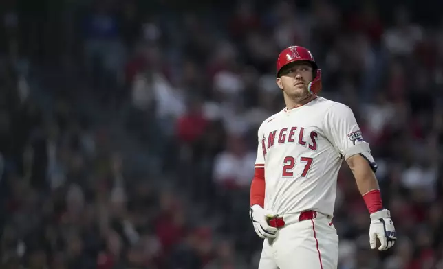 Los Angeles Angels outfielder Mike Trout watches after hitting a foul ball during the fourth inning of a baseball game against the Pittsburgh Pirates Wednesday, April 23, 2025, in Anaheim, Calif. (AP Photo/Eric Thayer)