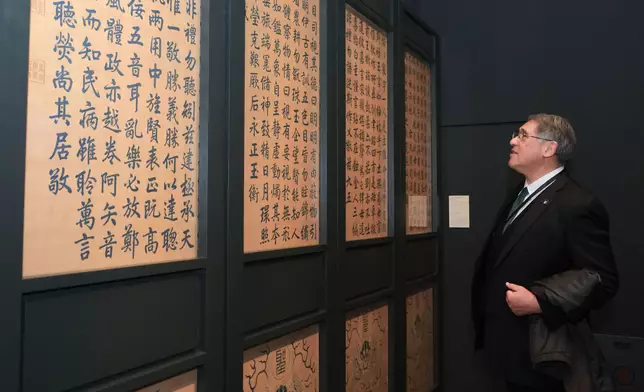Chairman of the Institute of Philanthropy and Trustee of The Hong Kong Jockey Club Charities Trust Lester Huang tours the “Rejoicing in Woods and Springs: A Journey through Garden Cultures in China and the Wider World” exhibition.