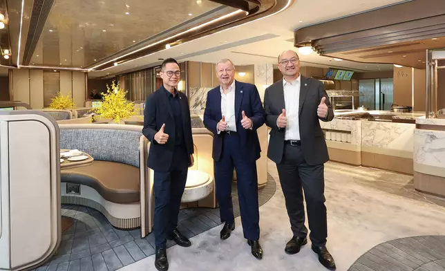 The Hong Kong Jockey Club’s Chief Executive Officer Winfried Engelbrecht-Bresges (centre), Executive Director, Customer Strategy, Insights and Innovation Dennis Hau (left), and Executive Director, Corporate Affairs Raymond Tam (right) congratulate on the reopening of Inner Circle after enhancement.