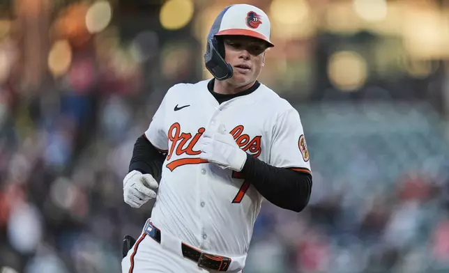Baltimore Orioles' Jackson Holliday rounds the bases after hitting a grand slam during the second inning of a baseball game against the Cleveland Guardians, Wednesday, April 16, 2025, in Baltimore. (AP Photo/Stephanie Scarbrough)