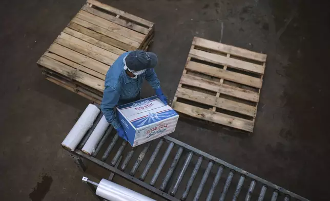 Shrimp are prepared for shipping at the Bowers Shrimp Processing plant, Wednesday, April 9, 2025, in Palacios, Texas. (AP Photo/Eric Gay)