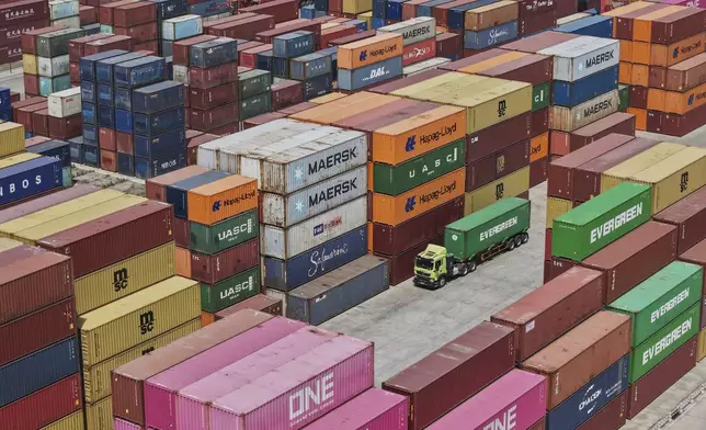 An aerial view of Xiasha Container Terminal on a canal in Hangzhou in east China's Zhejiang province Sunday, April 6, 2025. (Chinatopix Via AP)