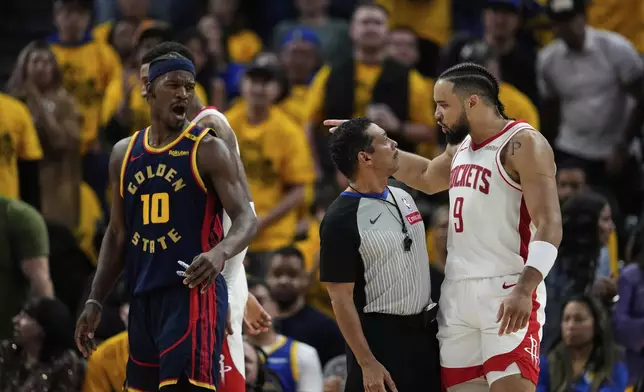Houston Rockets forward Dillon Brooks (9) talks to referee Bill Kennedy during the first half of Game 4 of an NBA basketball first-round playoff series against the Golden State Warriors, Monday, April 28, 2025, in San Francisco. (AP Photo/Godofredo A. Vásquez)