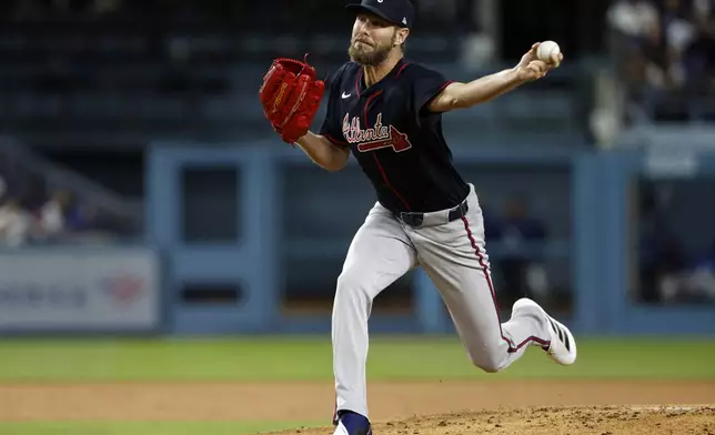 Atlanta Braves' Chris Sale throws against the Los Angeles Dodgers during the second inning of a baseball game Tuesday, April 1, 2025, in Los Angeles. (AP Photo/Kevork Djansezian)