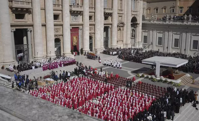 Pallbearers carry the coffin during the funeral of Pope Francis in St. Peter's Square at the Vatican, Saturday, April 26, 2025. (AP Photo/Markus Schreiber)