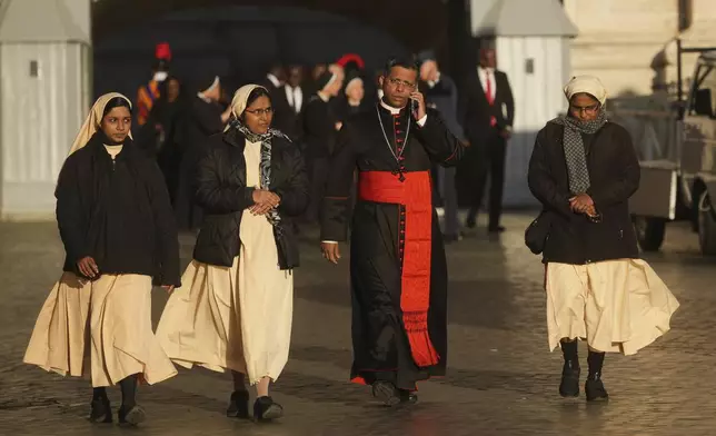 Cardinal George Jakob Koovakad, second from right, arrives for the funeral of Pope Francis in St. Peter's Square at the Vatican, Saturday, April 26, 2025. (AP Photo/Alessandra Tarantino)